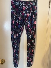 This Is A Pair of Reebok Leggings with An All-over Print. Size Medium/medium