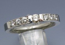 REIF-DESIGN - TRENDIGER 0,58 CARAT BRILLANT SPANNRING - UNIKAT