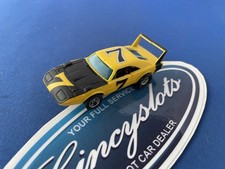 Aurora AFX Dodge Daytona Charger Superbird Yellow Black 7 HO Slot Car.