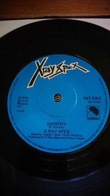 X-Ray Spex - Identity (7'', Sol) (Near Mint (NM or M-)) - 3208819445