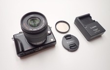 Panasonic LUMIX DMC-GF2 12.1MP Mirrorless Camera + Lumix G Vario 14-42mm Lens