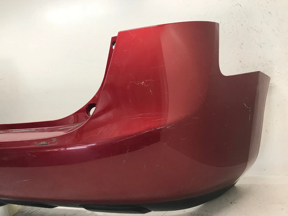 Cubierta de parachoques trasero roja 08-13 Nissan Rogue Select 14 15 SL SV S 85022-JM04H OEM Foto 2 de 4