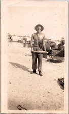 PH2509 WW2 Military Soldier Shirtless Man Munition Bomb Vintage Snapshot Photo
