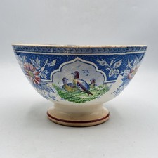 Bol en faïence de Sarreguemines Digoin à décor floral et d’oiseaux début XXème