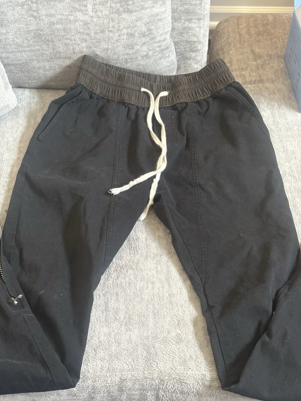 Fear of God mens cargo pants distressed streetwear style  