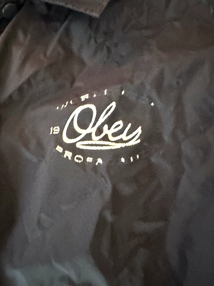 Chaqueta cortavientos azul Obey botón a presión talla grande 100 % nailon patinador callejero Foto 3 de 4