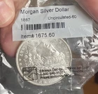 1887 Morgan Dollar. Sold As Uncirculated By Littleton Coin.