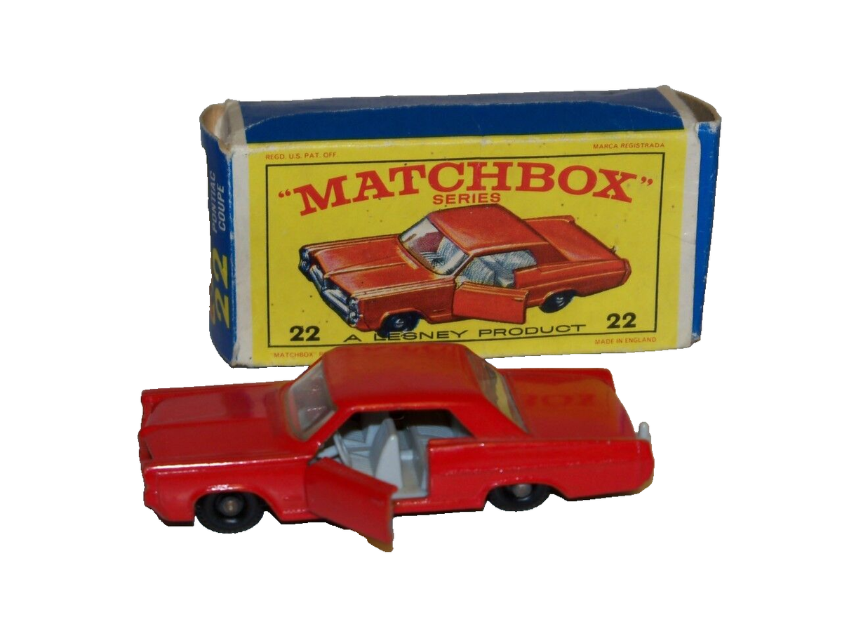 MATCHBOX #22 PONTIAC COUPE(MIB) SUPER CLEAN(BRIGHT RED)DOORS OPEN