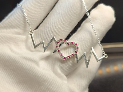 Lab Created 0.20 Ct Ruby & Moissanite 925 Silver Love Heart Beats Pendant Chain