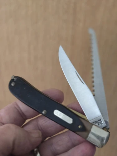 New Unused970 USA OLD TIMER BEARHEAD TRAPPER. SAW CUT DELRIN HANDLE,NO BOX