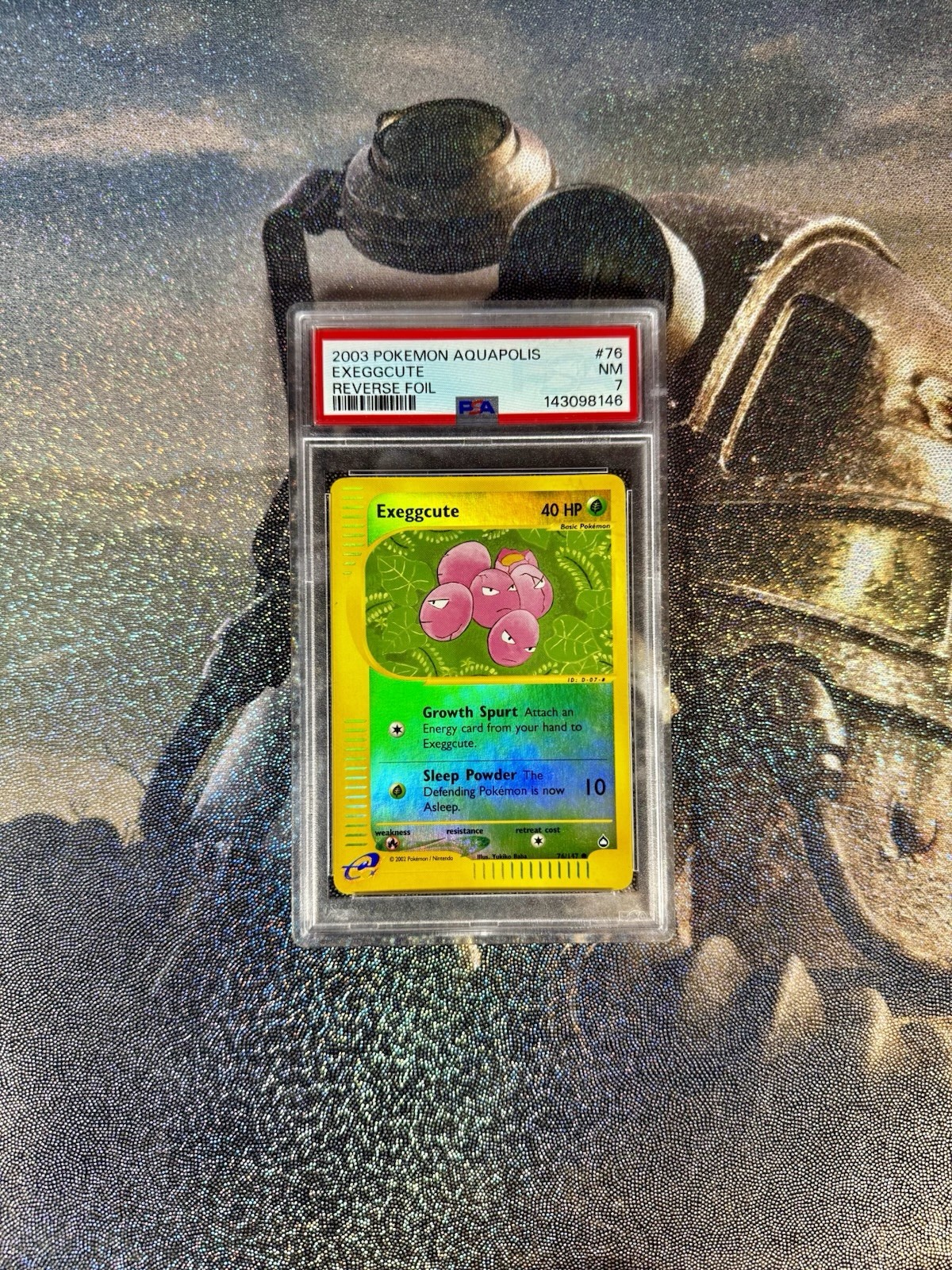 Nintendo 2003 Pokemon Aquapolis Exeggcute 76/147 Reverse Holo PSA 7 EN