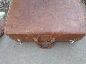tooled leather luggage