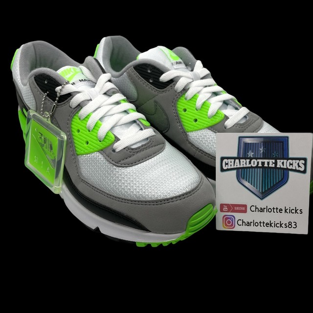 lime green and grey nike shoes