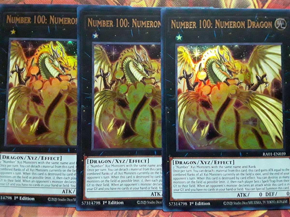 yugioh numeron dragon deck Amazon.com: Number 100: Numeron Dragon (PUR) - RA01-EN039 - Prismatic  Ultimate Rare main image 1