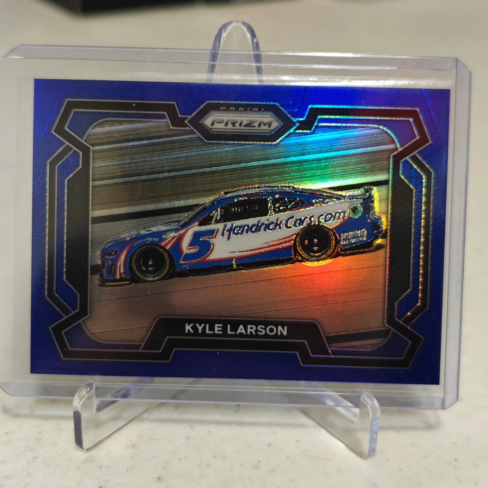 KYLE LARSON 2024 PANINI PRIZM RACING NASCAR RIDES #73 BLUE PRIZM 022/199
