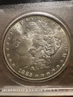 1885 O Morgan Silver Dollar Stunning Coin 0304103. Beautiful Coin. Old Holder.