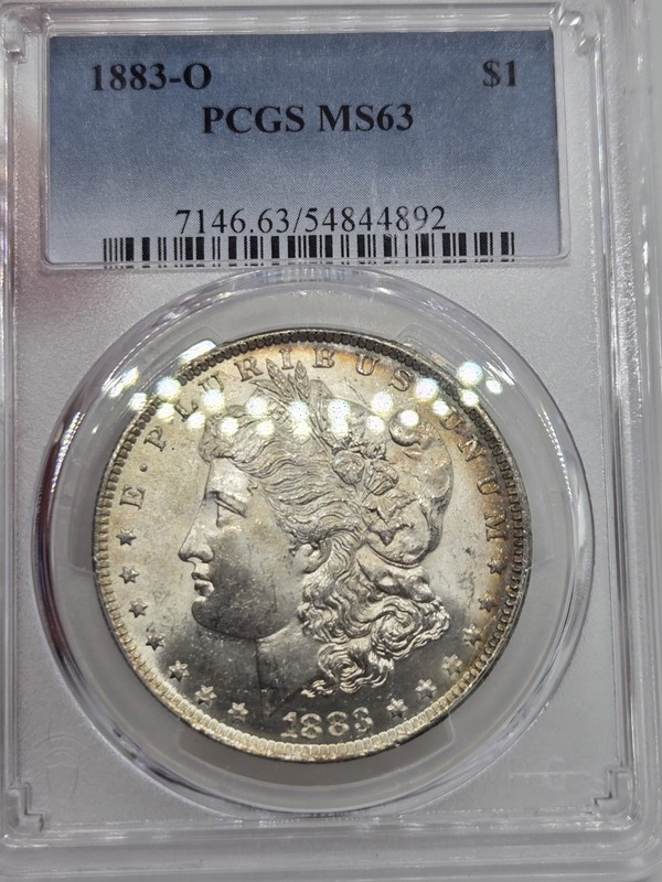 1883-O $1 Morgan Silver Dollar PCGS, MS 63 W Edge Toning