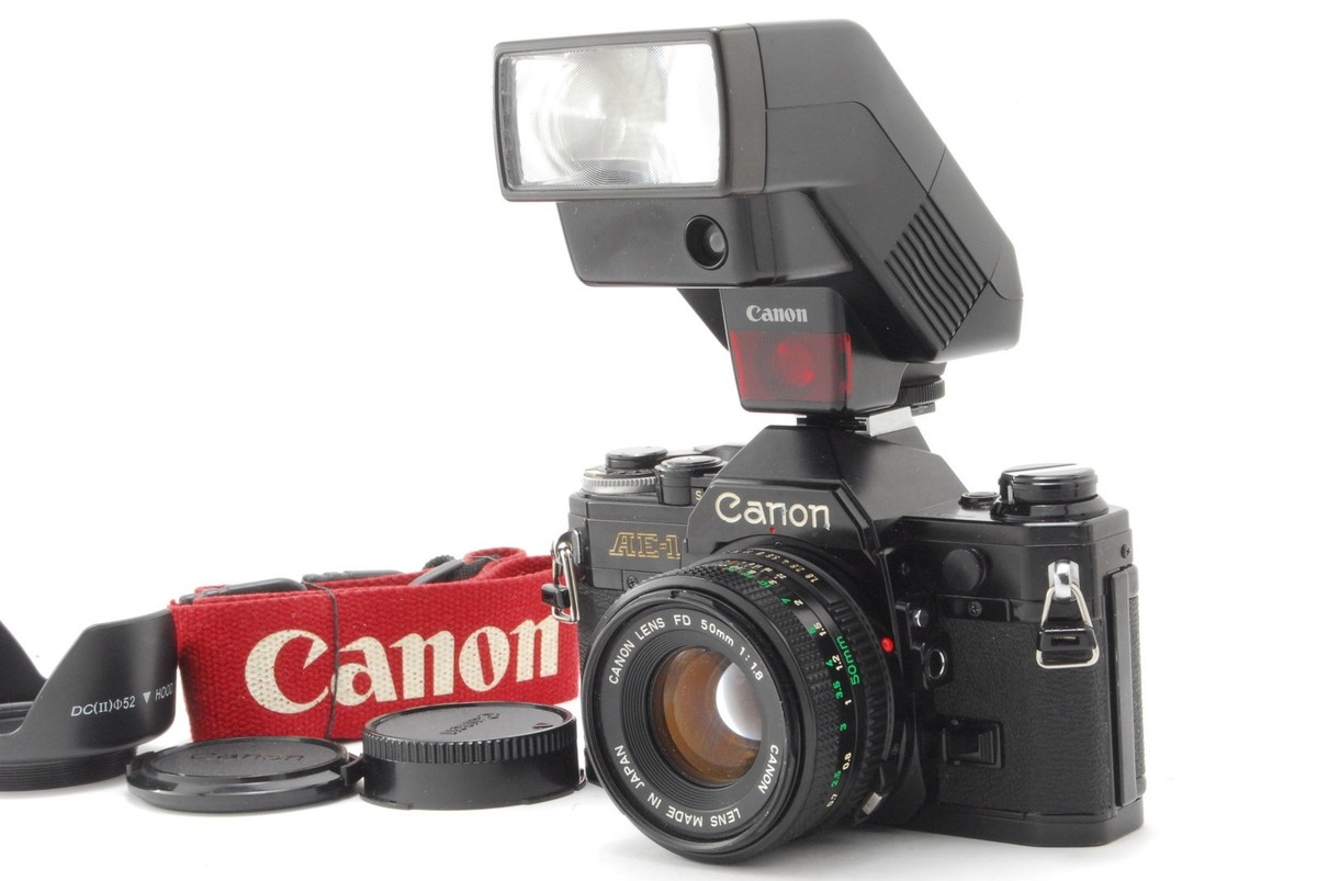 CANON AE-1 Black film Camera w/NFD 50mm F/1.8 MF Lens, Flash and