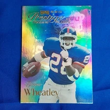 Tyrone Wheatley 1999 Playoff Prestige SSD Football Trading Places card #B141