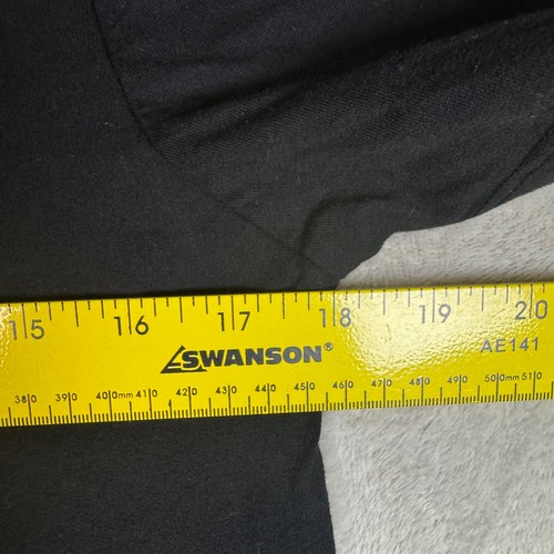 Black NWOT crewneck short sleeve t-shirt with yellow measuring tape showing size S, made in USA.
