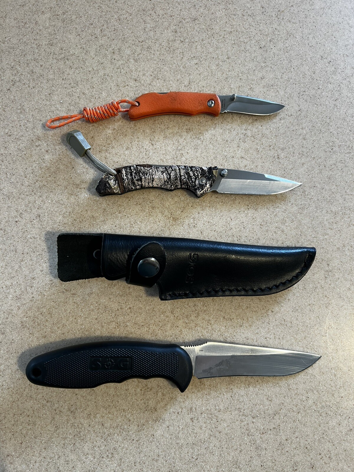 Sog Field Pup I / Buck Bantam 284 / Outdoor Edge Mini Grip…. Three