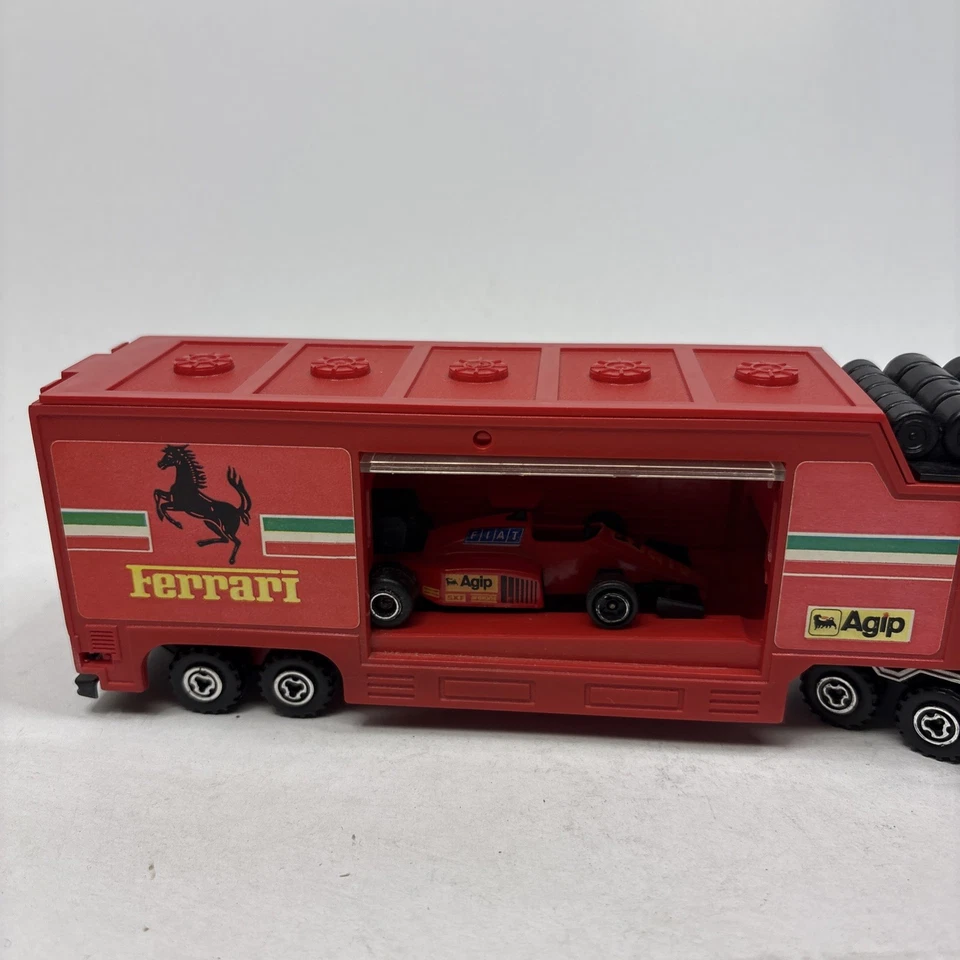 MAJORETTE SUPER MOVERS Camion FERRARI F1 TEAM TRANSPORTER + Auto 3065 Vintage #1 - Immagine 3 di 4