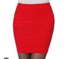 Turn heads in this bold and stylish red strapless bodycon mini dress, featuring