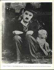 Press Photo Charlie Chaplin with Puppy in "The Chaplin Review" Film - hcq29518