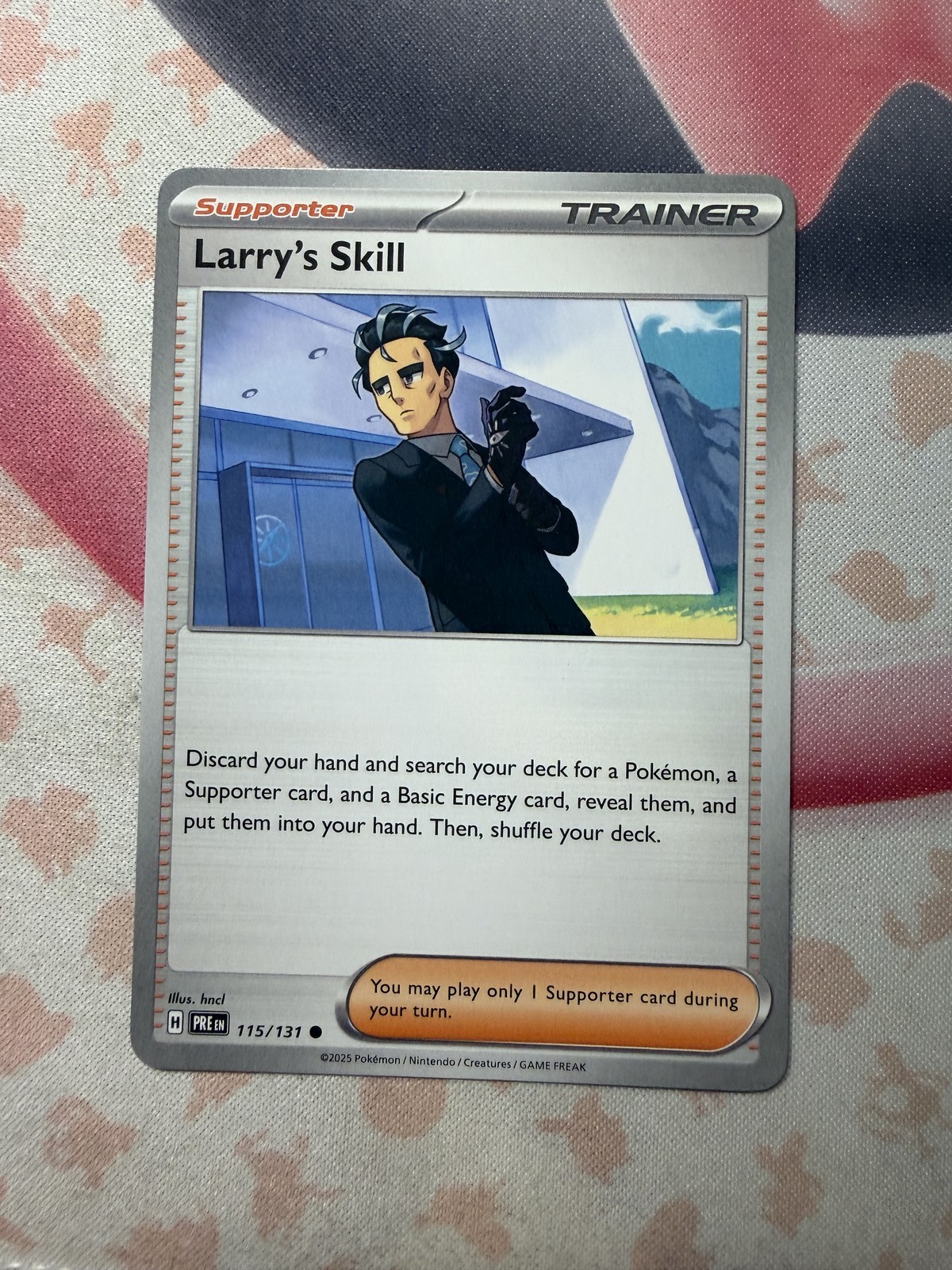 Larry's Skill - Common SV: Prismatic Evolutions 115/131 NM English Pokemon Card