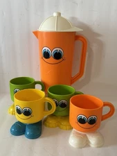 Vintage DEKA Footsie Tootsie Happy Face Orange Plastic Footed Pitcher & 4 Cups