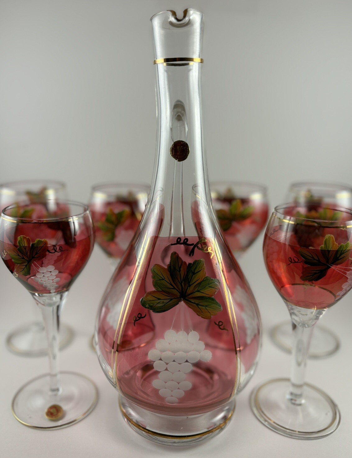 Vintage Cranberry Decanter & 6 Wine Glasses/ Gold Trim  (Made in Romania)