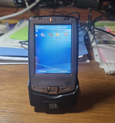 HP IPAQ Hx2490c Pocket PC with screen cover, charger, extra battery. (No pen)