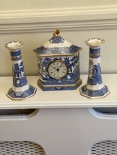 wedgewood willow pattern clock and a pair of candlesticks 