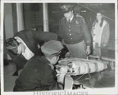 #ad 1972 Press Photo Boston Airport Security checking a traveler#x27;s package $24.99