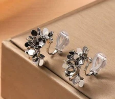 Trendy clip on 1" shiny silver flower cluster earrings
