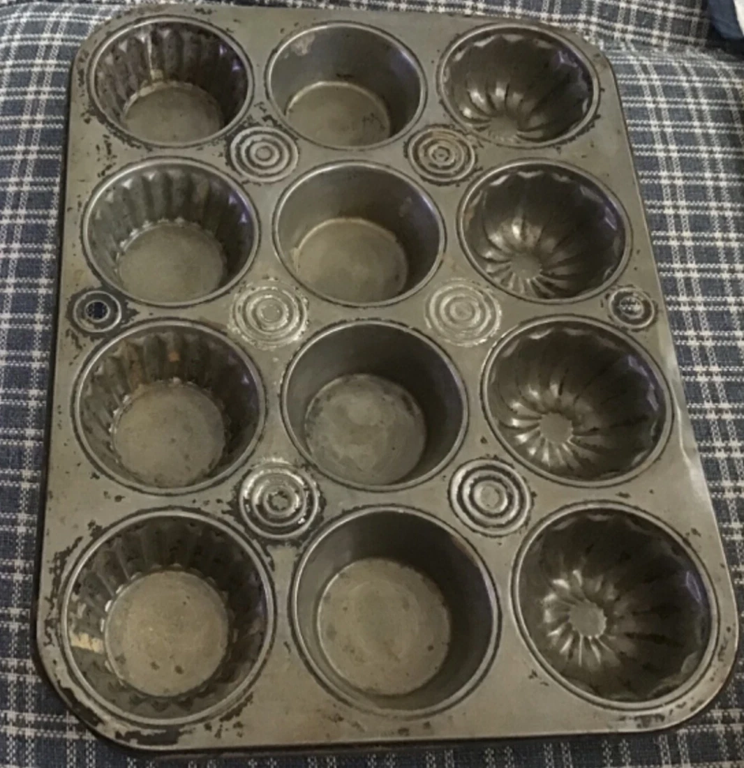 VTG. Muffin/Cupcake Tin 12 holes 3 designs molds Country Primitive Decor
Opens in a new window or ta