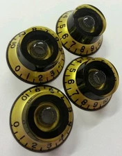4 Guitar Top Hat volume/tone knobs. Inca Gold Met/Black. JAT CUSTOM GUITAR PARTS