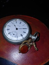 Antique Elgin pocket watch with decorative fob