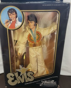elvis doll in box