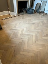 QUALITY NEW HERRINGBONE ENGINEERED WOOD FLOORING.12/2x90x400.OAK/GREYS.” SAMPLE”