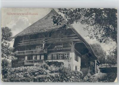 10048420 - Jesus hangs on the cross at the top of the balcony Black Forest House 1906