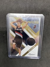 2010-11 Prestige Prestigious Picks Gold Materials /99 Luke Babbitt #16 Rookie A2