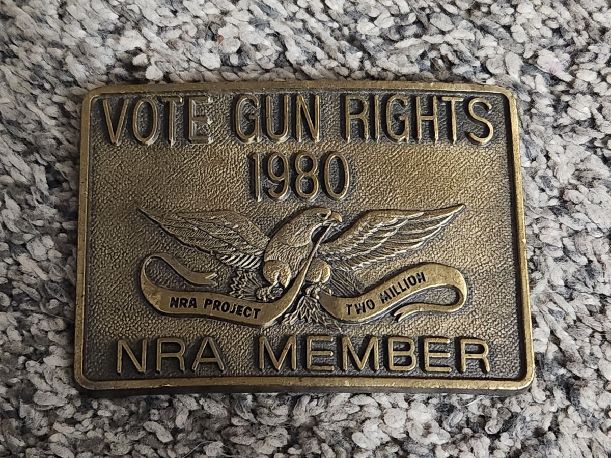 Vintage 1980 Vote Gun Rights NRA Member Belt Buckle Project Two Million Brass Vintage Black Leather Belt W/ 1980 NRA Member Vote Gun  main image 2