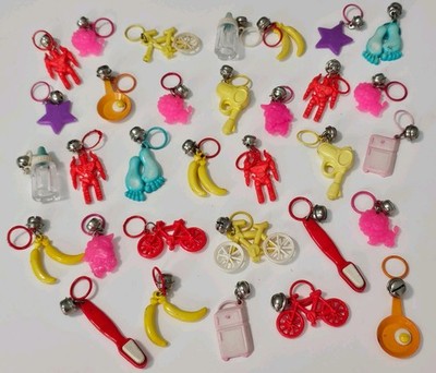 Vtg 80s Plastic Bell Charms Lot 32 Novelty Toy Robot Bicycle Banana Toothbrush 
