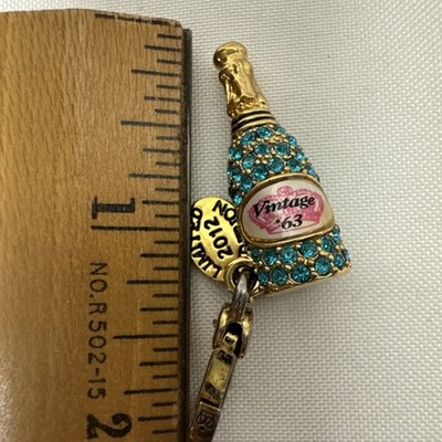 Juicy Couture 2012 Charm Brut Champagne Gold Tone Blue Rhinestones In A JC Box