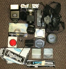 Olympus OM-1+Zuiko 35-105+Vivitar 2x macro+Olympus winder+Sunpak flash+filters