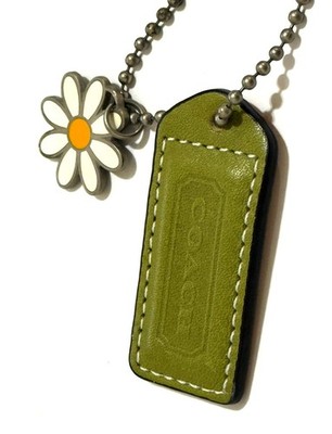 NICE VINTAGE COACH EMBOSSED GREEN LEATHER DAISY MOTIF BAG HANGTAG