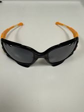 Oakley Jawbone nero lucido/arancione atomico con lenti ventilate nere iridio 