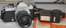 Nikon Nikkormat Camera with wide angle lens + flash light