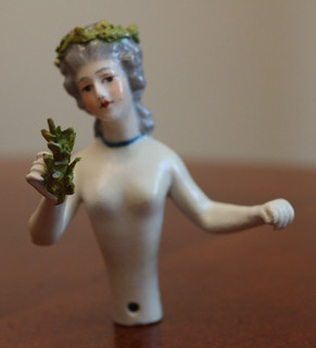 VTG PORCELAIN GERMAN HALF DOLL NUDE LADY W/GREEN FLORAL CROWN ARMS AWAY